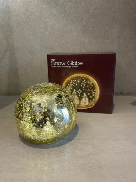 GOLDEN SNOW GLOBE LL